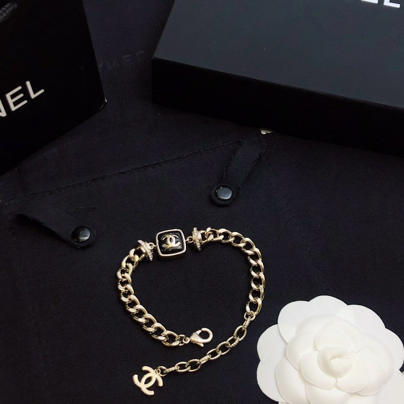 Chanel Black Logo Gold Chain Bracelet